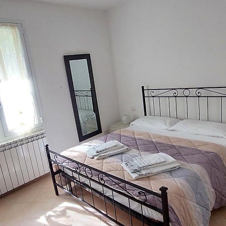 Appartamenti Enrica โมเนเลีย ภายนอก รูปภาพ